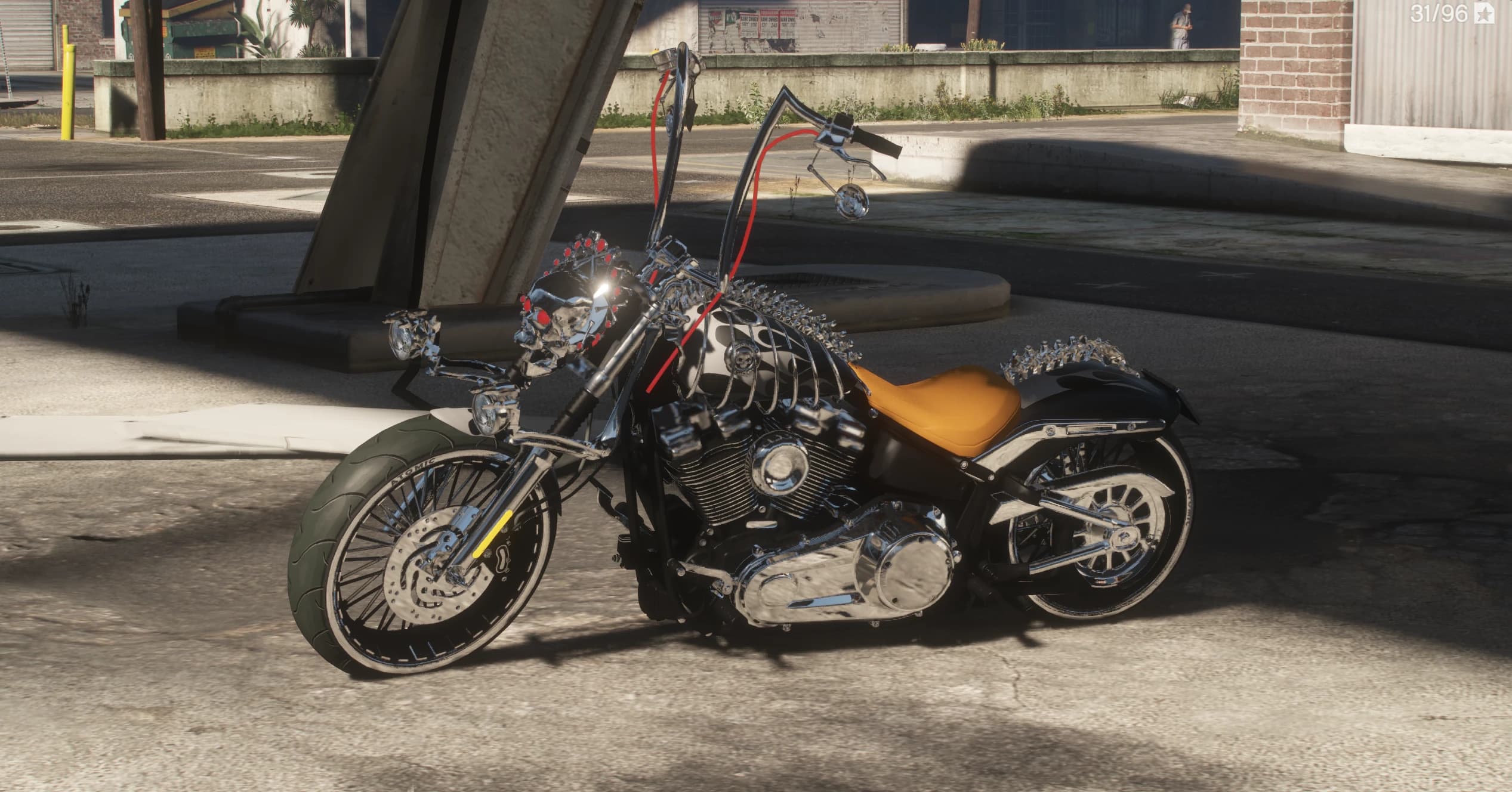 Vista lateral del chopper custom negro con manillar alto tipo ape hanger, cables rojos brillantes, una calavera cromada sobre el faro, detalle de columna con púas y asiento individual ámbar
