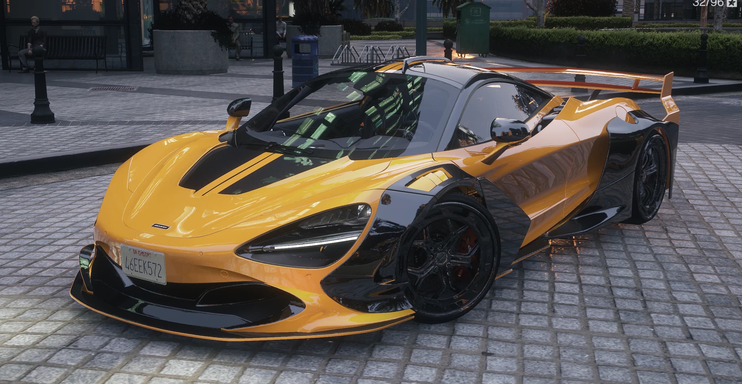 Vista frontal en tres cuartos del McLaren 720s amarillo con el kit ensanchado Zacoe y detalles en carbono en GTA V Enhanced