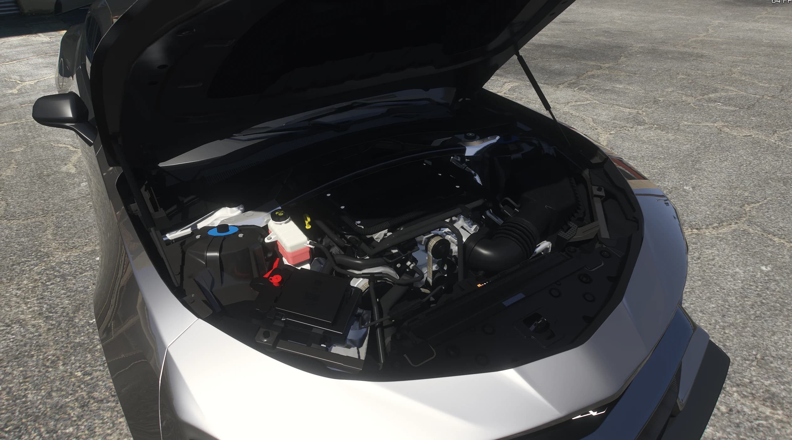 Capó abierto mostrando el vano motor completamente modelado con el tubo de admisión, los depósitos de líquidos y la caja de la batería