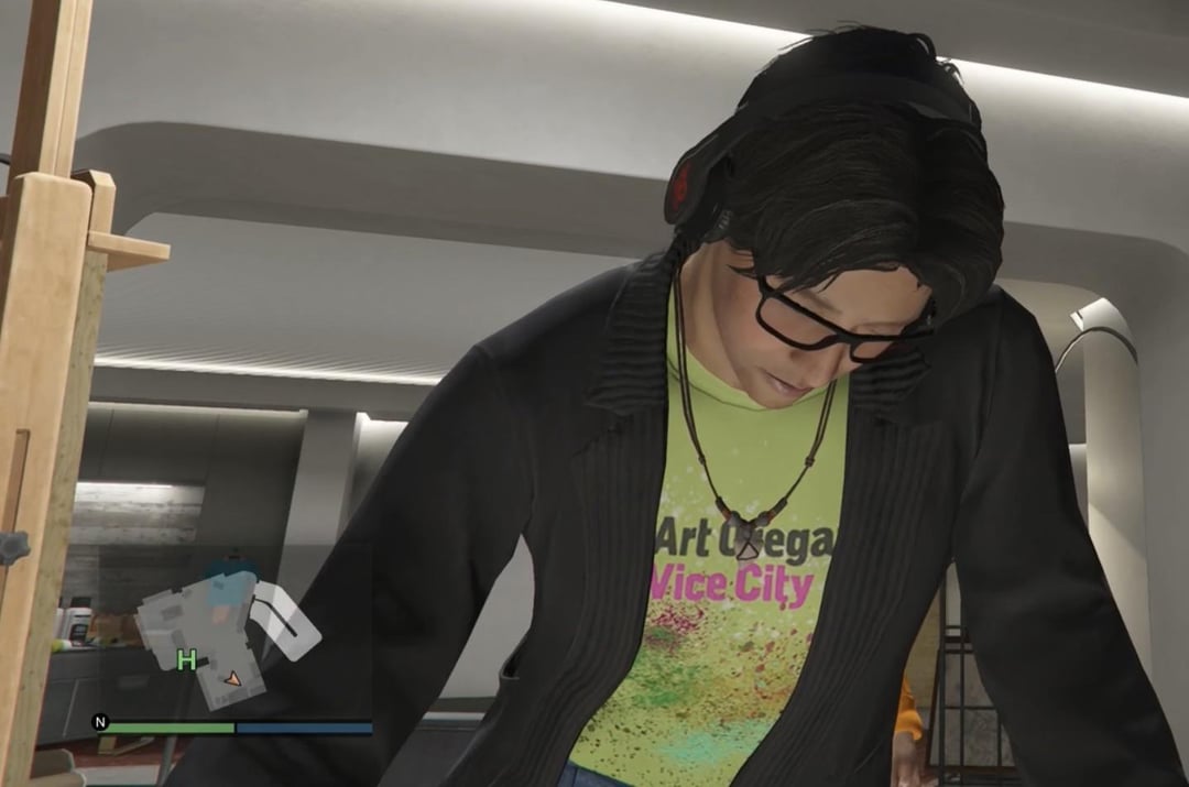 A GTA Online NPC in glasses and headphones wearing a lime green t-shirt that reads Art Omega Vice City